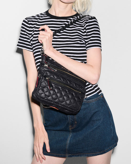 MZ Wallace Double Zip Crossbody Bag on woman's shoulder