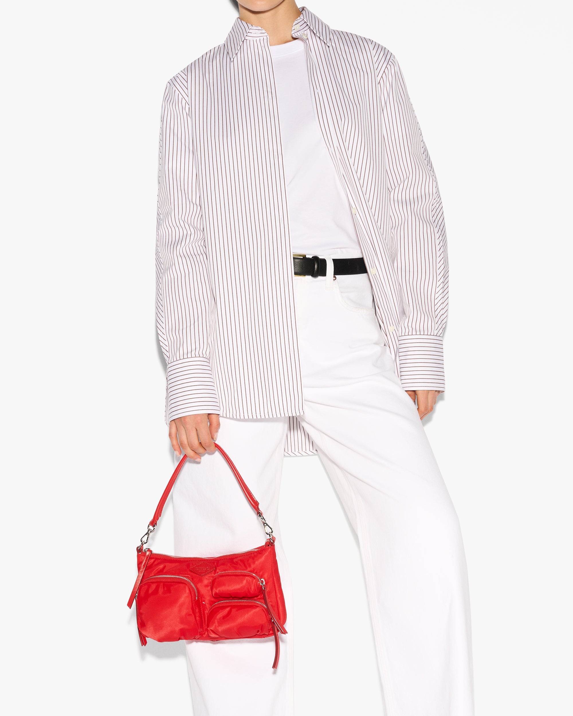 Person holding MZ Wallace Cherry Red Shoulder Bag in hand