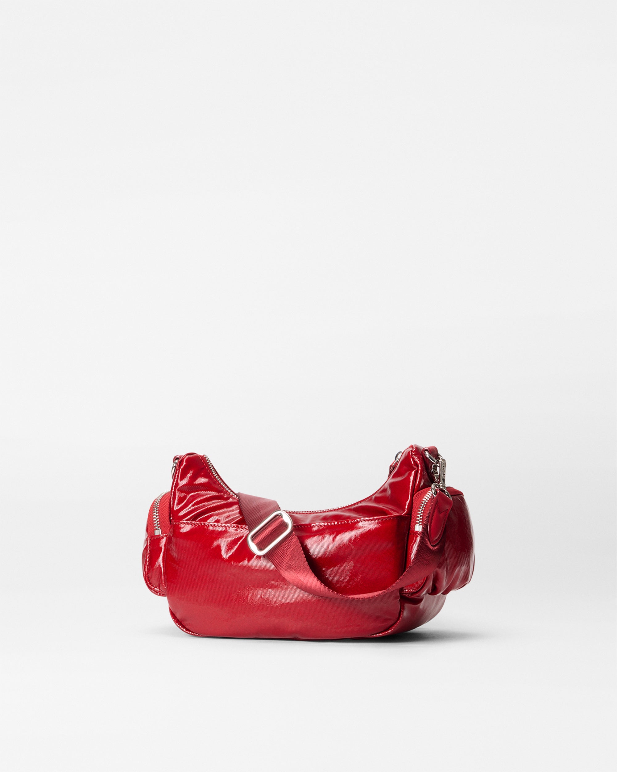 MZ Wallace Small Red Shoulder Bag with straps on body of bag