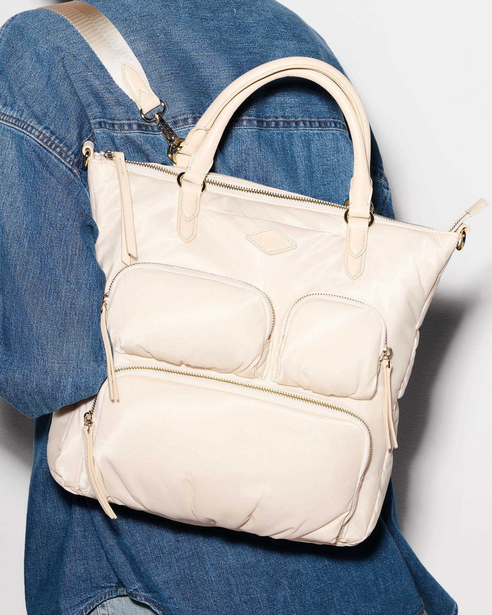 MZ Wallace Ivory Backpack worn as backpack