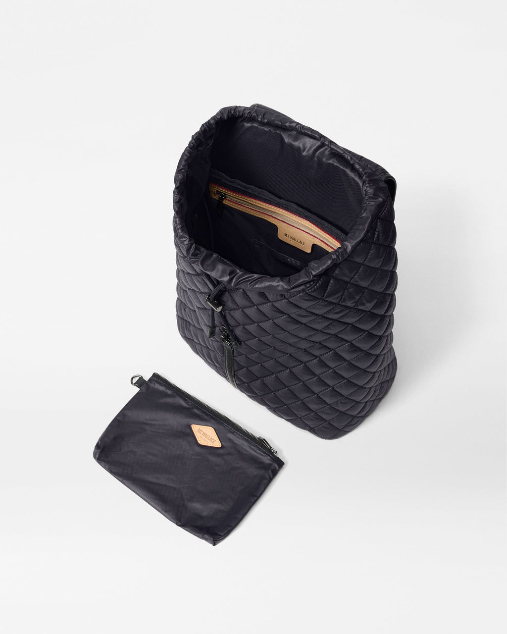 MZ Wallace Black Spacious Backpack open with accessories