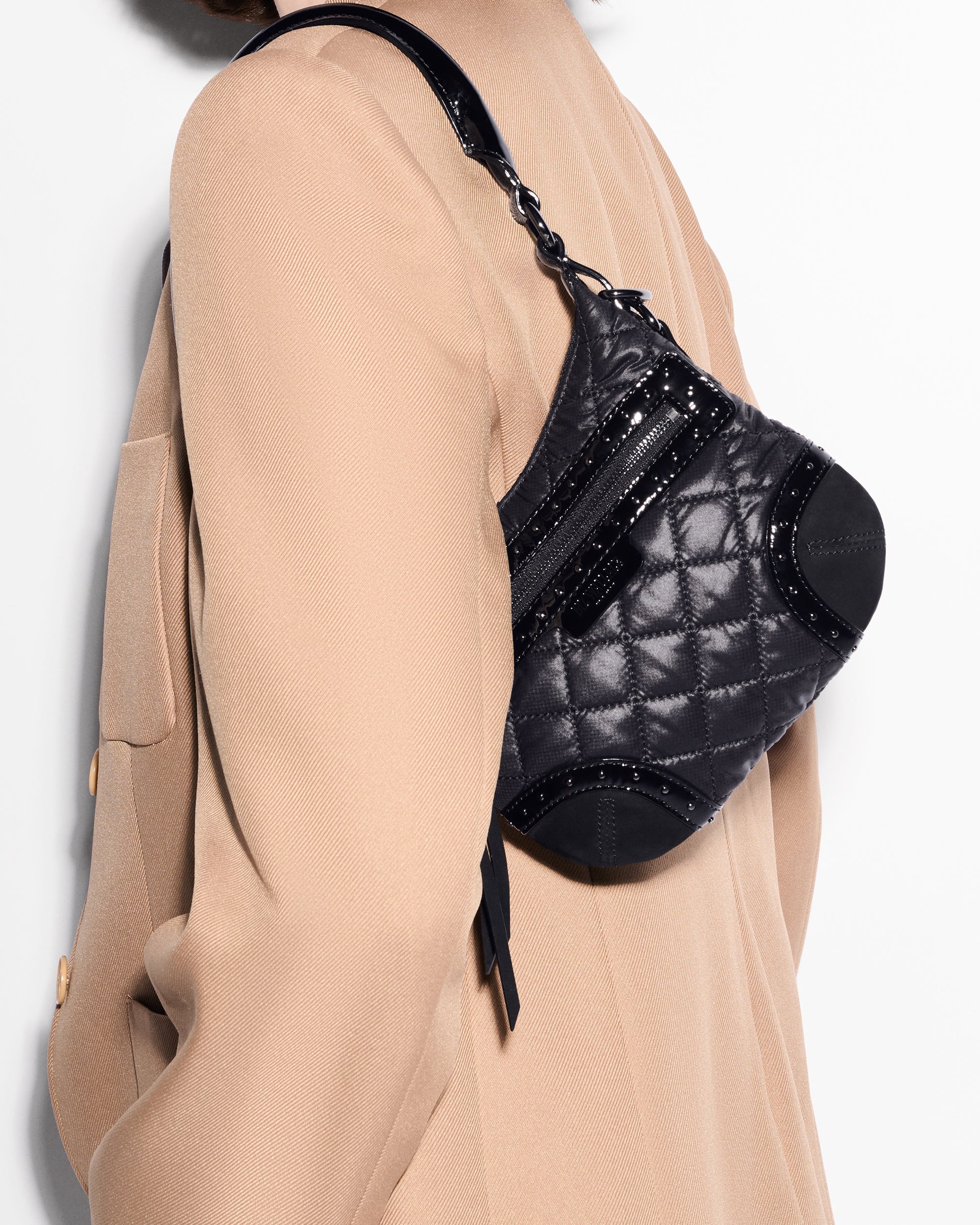 MZ Wallace Black Studded Handbag on shoulder