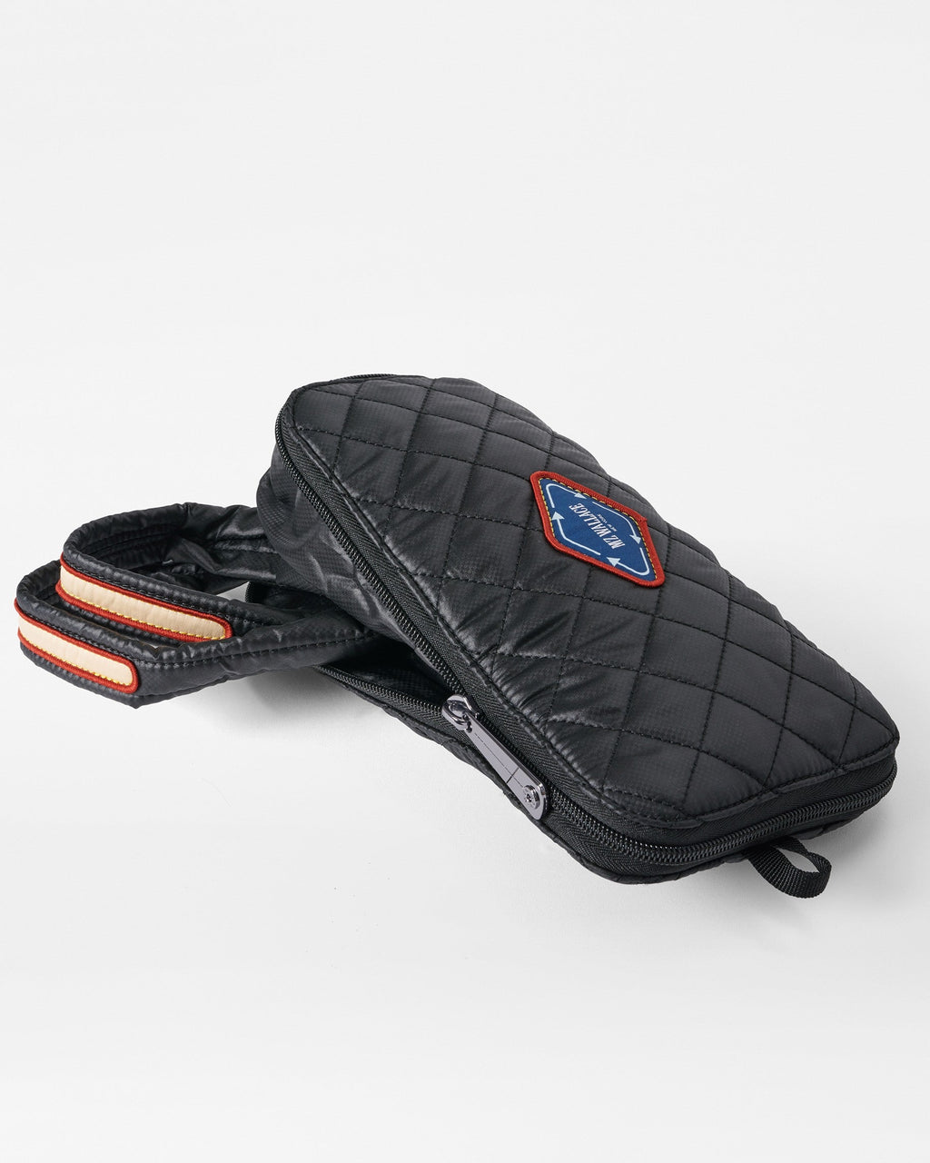 MZ Wallace Sustainable Tote Bag folded up and placed in zip up compartment 