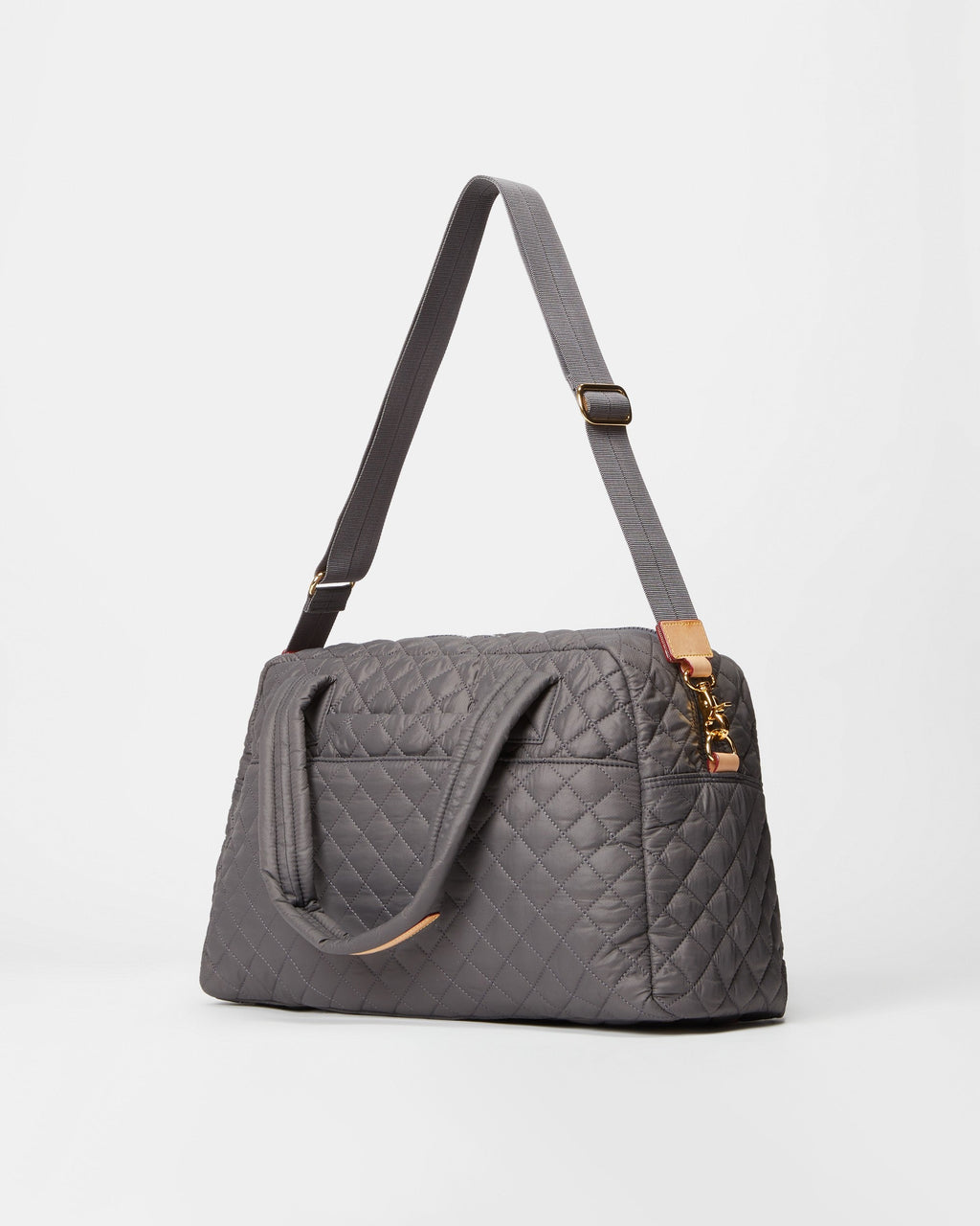 MZ Wallace Gray Duffle Bag for Travel with accessories on